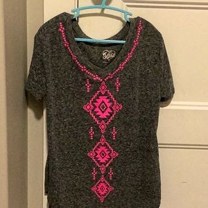 I am selling a justice shirt for kids (girls)